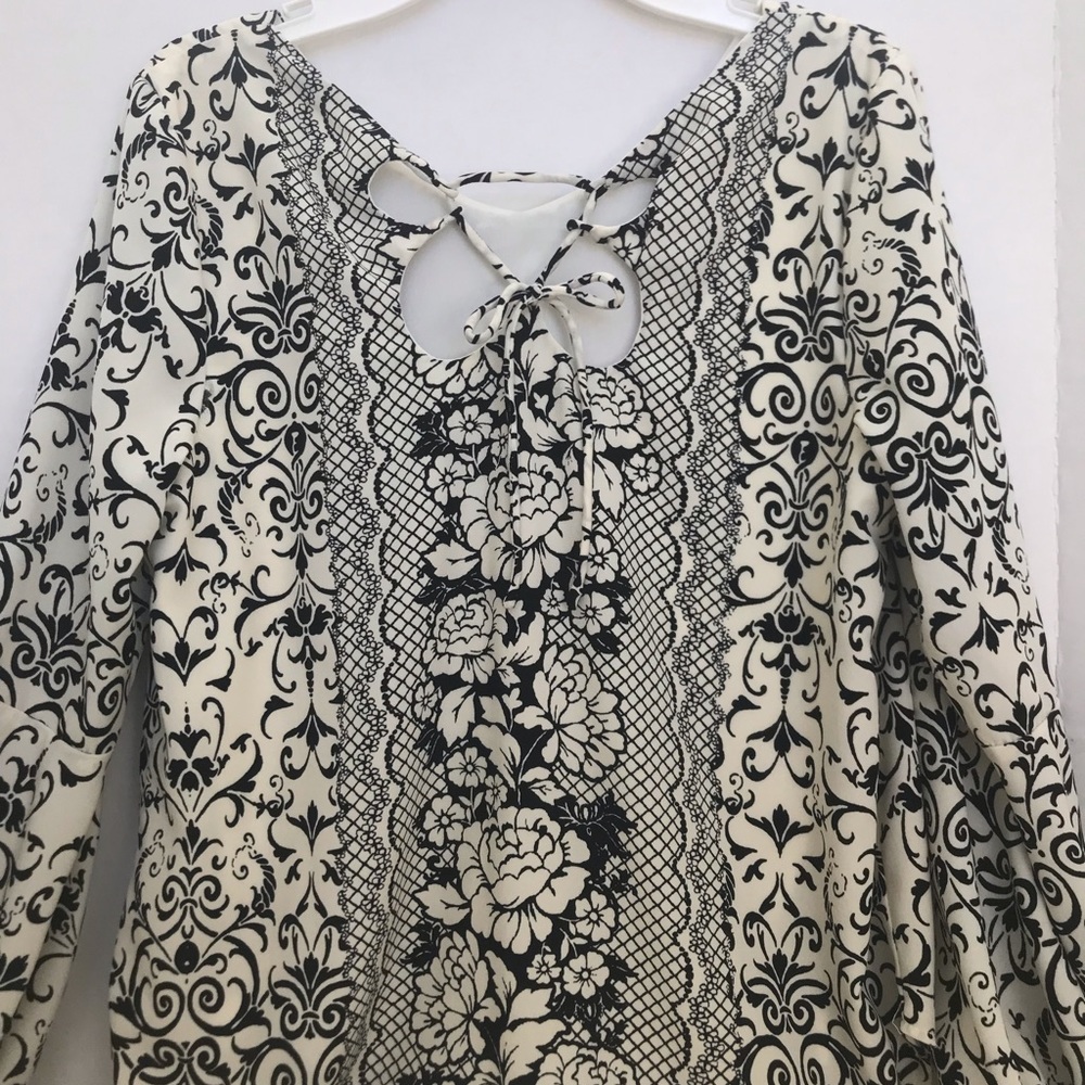 Black and cream blouse